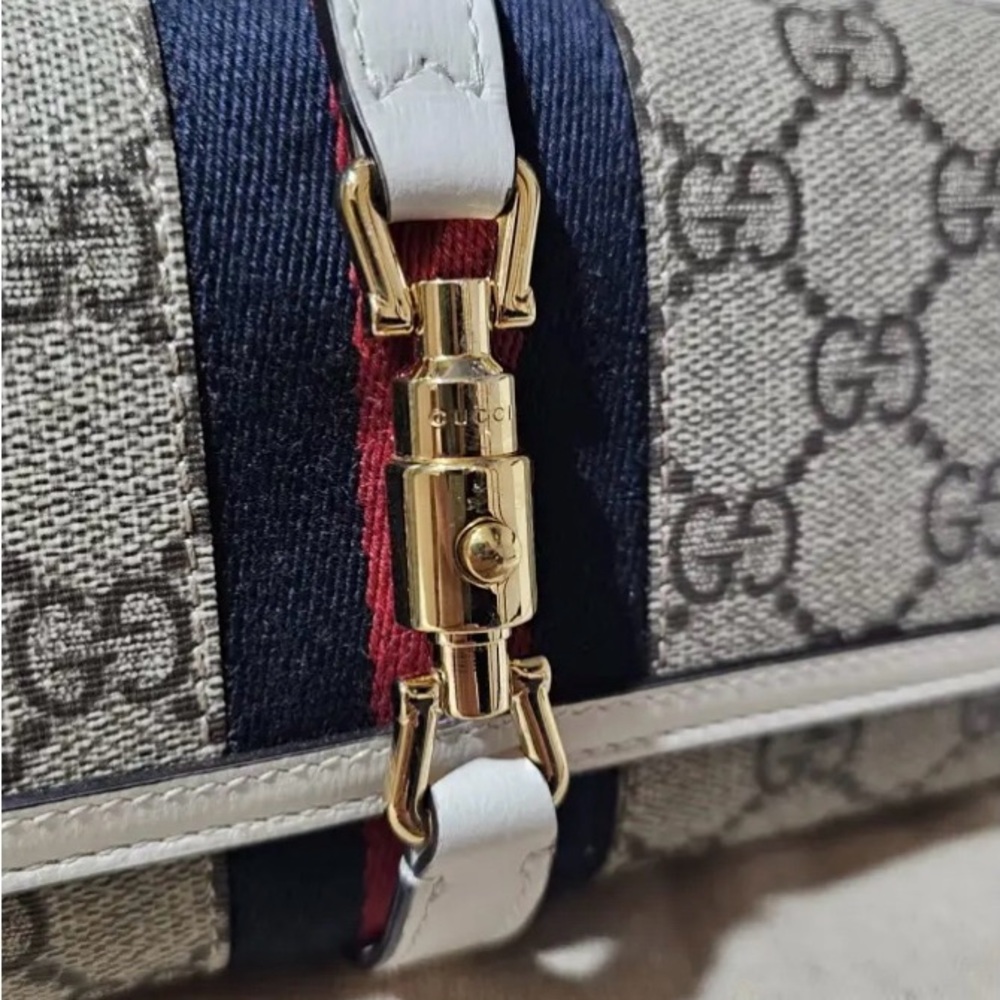 Gucci Beige and Black Clutch with Gold Accents - Picture 2 of 5